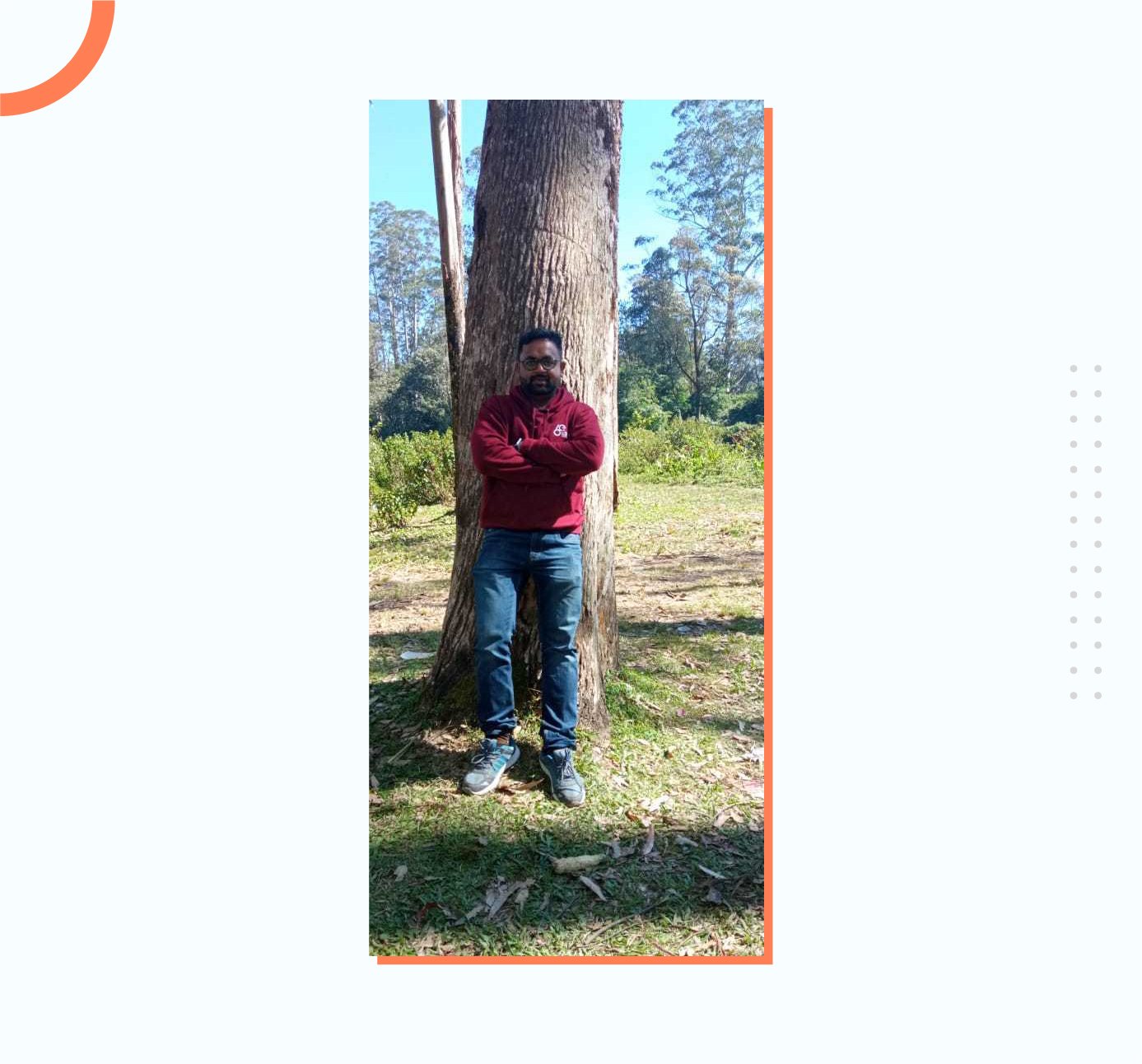 Binny standing near a tree